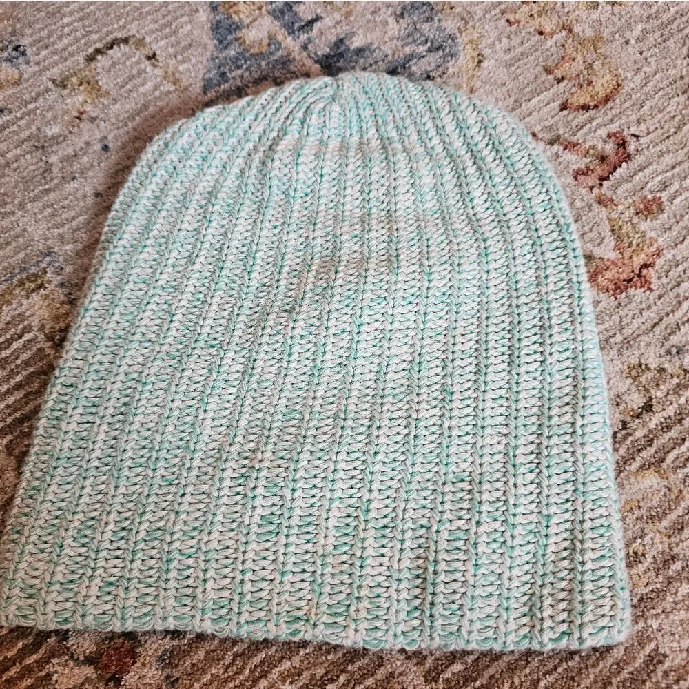 Love your melon teal and white beanie with leather patch